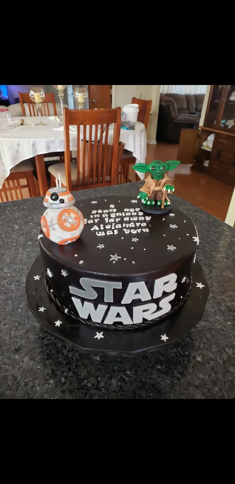 Star Wars birthday cake in black with hand modelled droids and a starfield